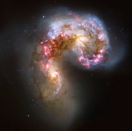 The Antennae Galaxies/NGC 4038-4039.  Photo Credit: NASA, ESA, and the Hubble Heritage Team (STScI/AURA)-ESA/Hubble Collaboration